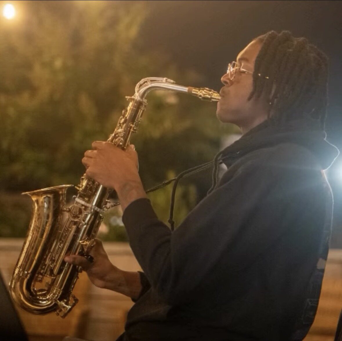 Ry Lo playing saxophone